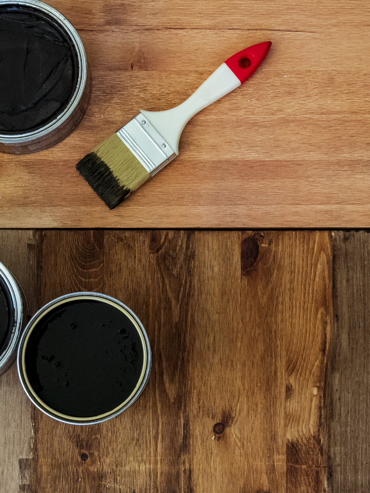 Hardwood, stain, and paint brush 